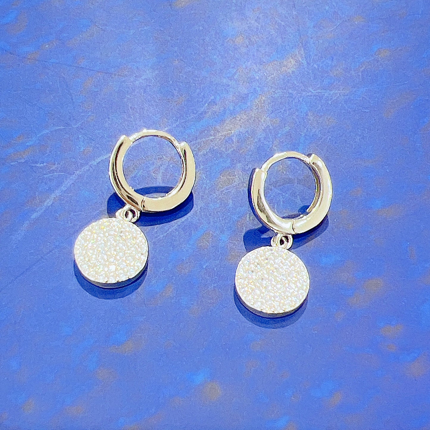 White zircon round shape silver 925 huggie earrings