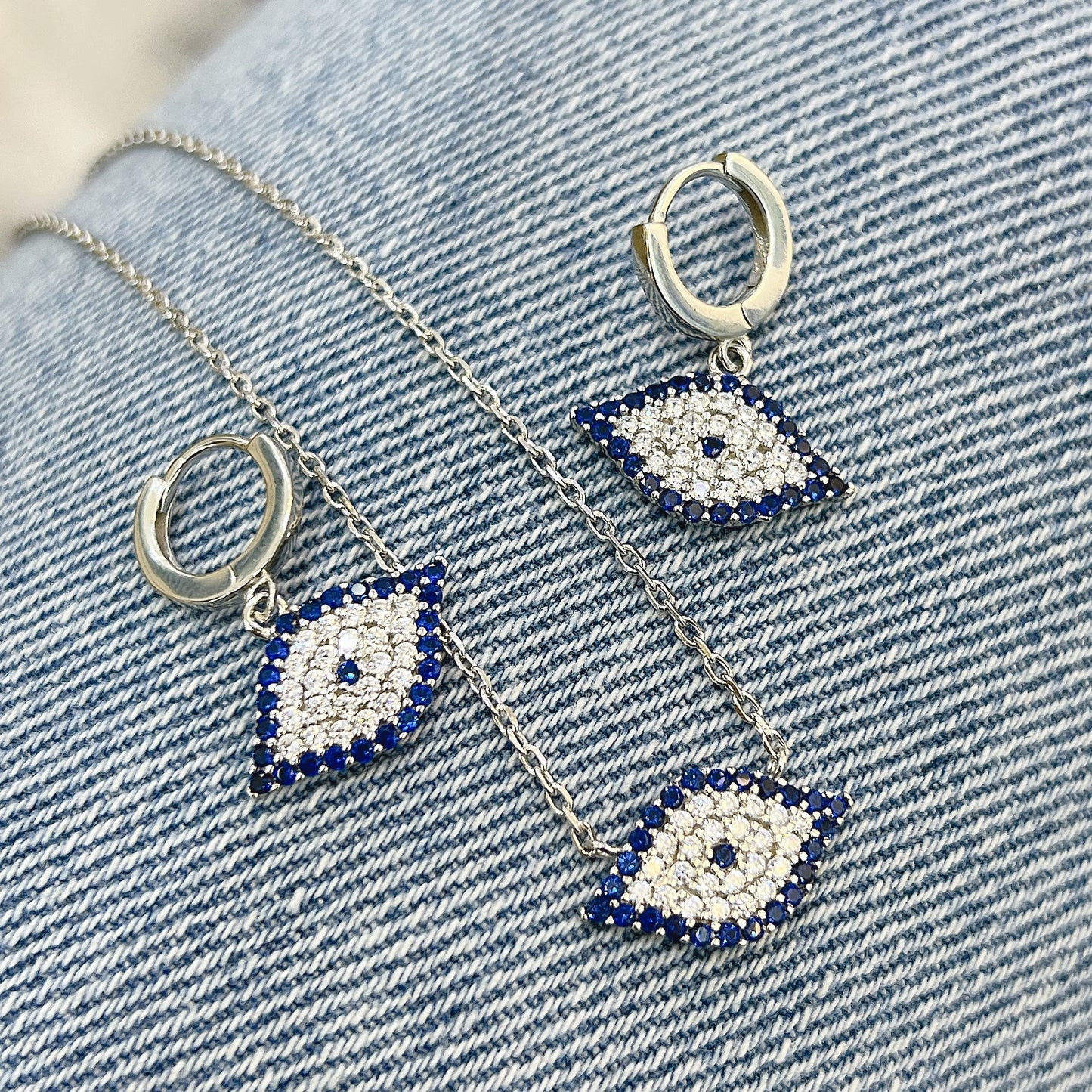 Sapphire and white zircon marquisee evil eye silver 925 huggie earrings