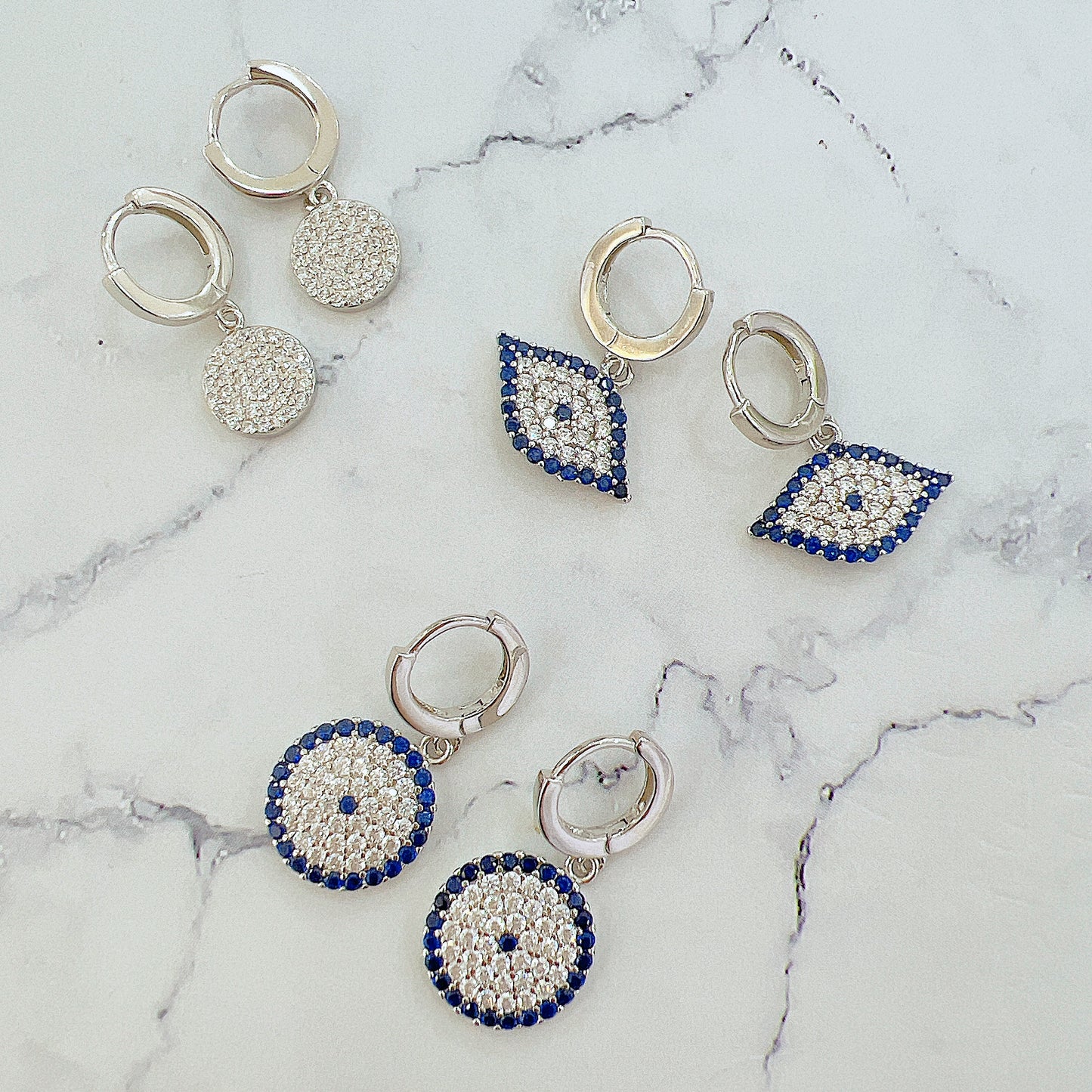 Sapphire and white zircon marquisee evil eye silver 925 huggie earrings