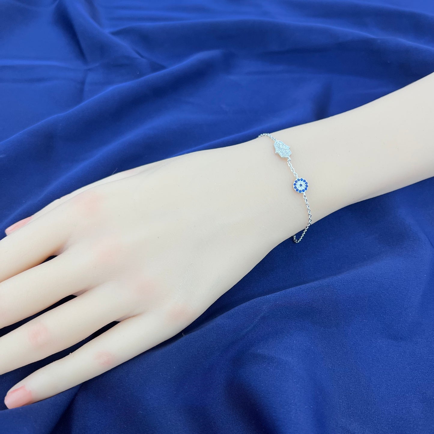 Sapphire and white zircon hamsa hand with round evil eye silver 925 jewelry bracelet