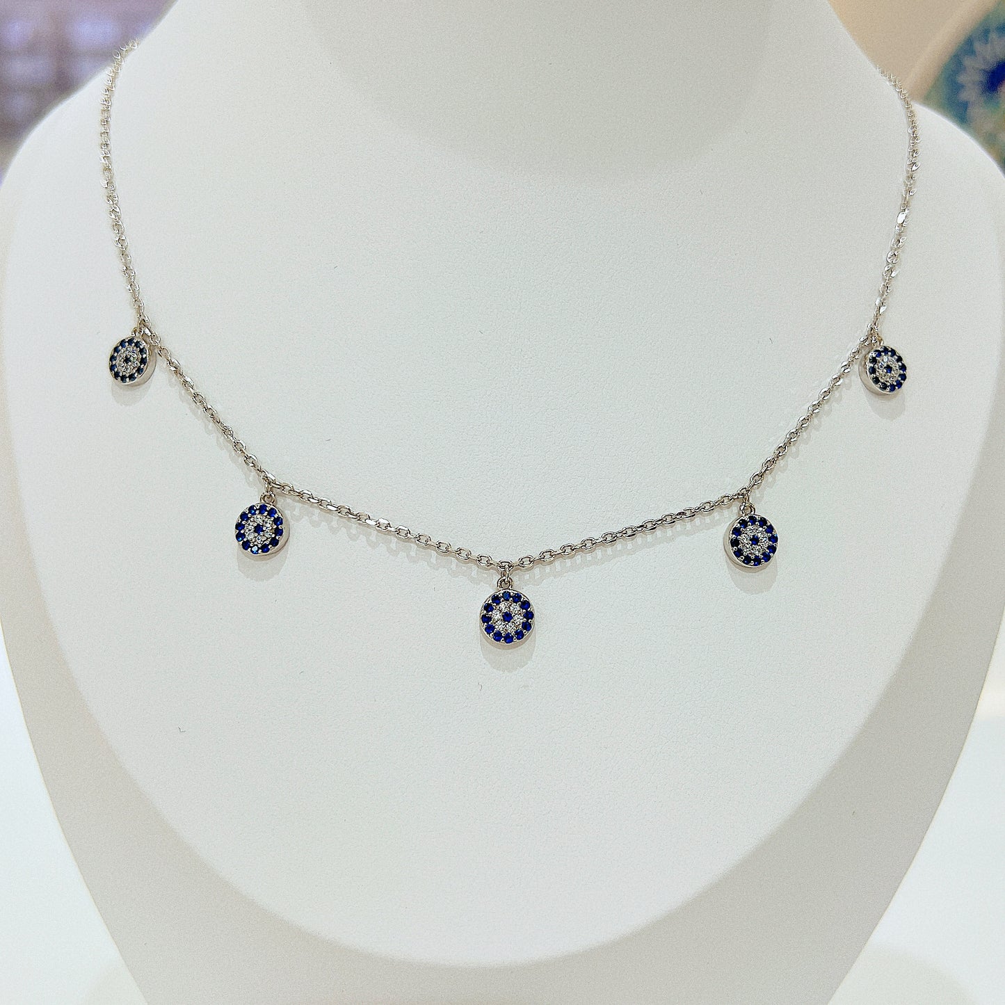 Sapphire and white zircon 7mm round shape 5 evil eyes silver 925 necklace